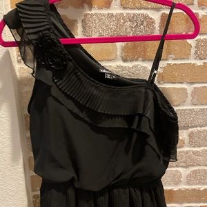 Black ruffled shirt with flower